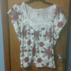 White blouse with a red & black pattern